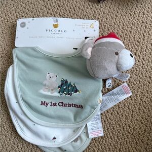 My first Christmas bibs and rattle